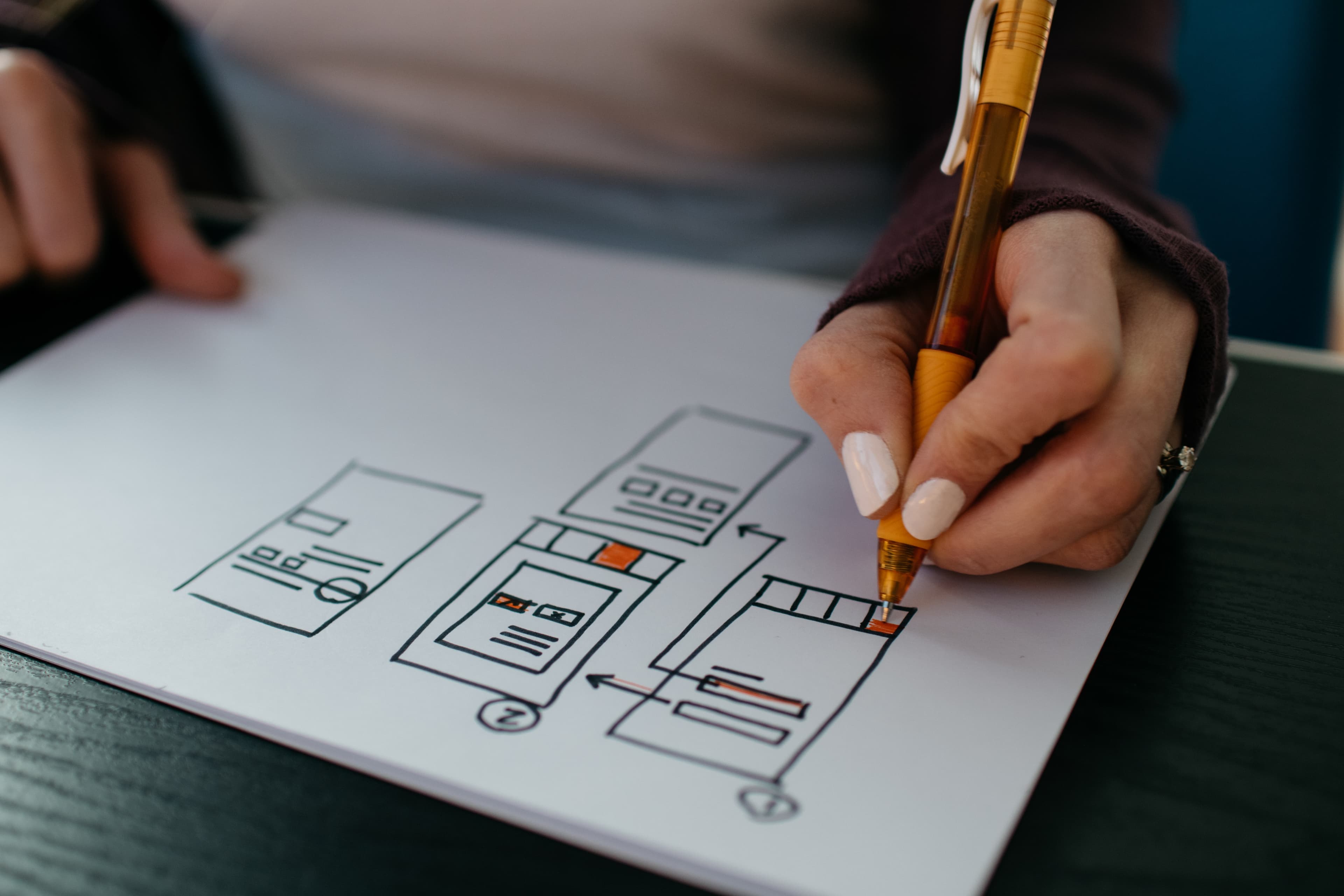 Design work spread across a desk